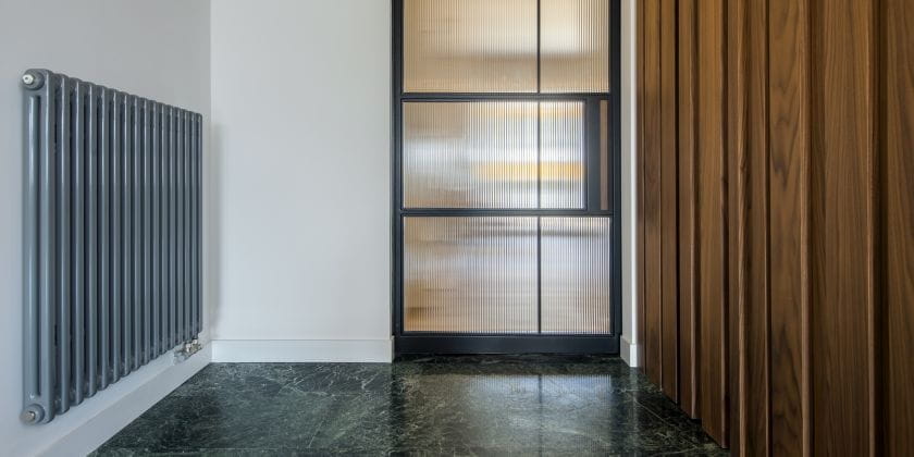 Hvac design Barault Architects hallway Delta column radiator